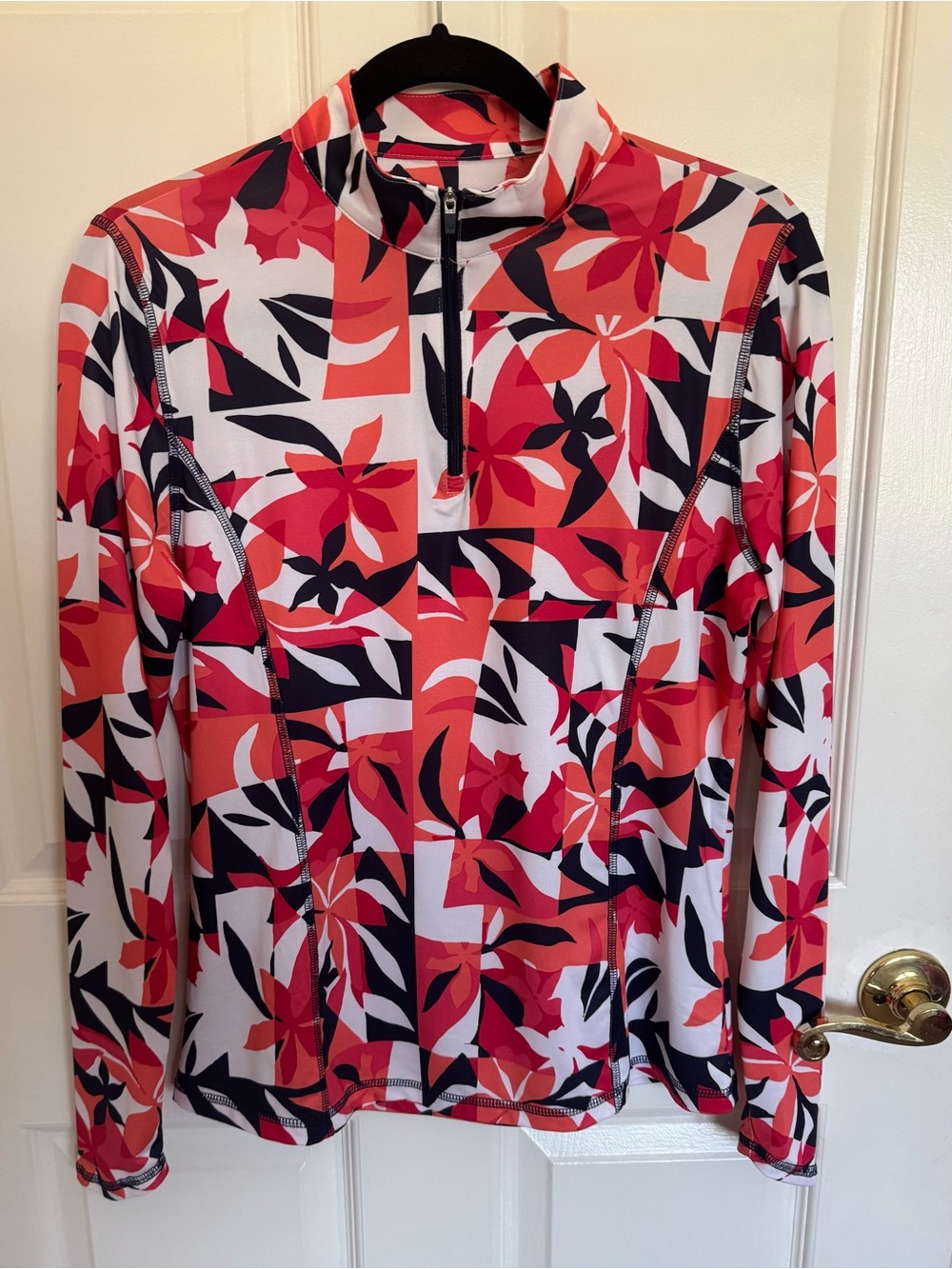 Gorgeous Callaway golf shirt size medium. Zippered collar.  No pockets.
